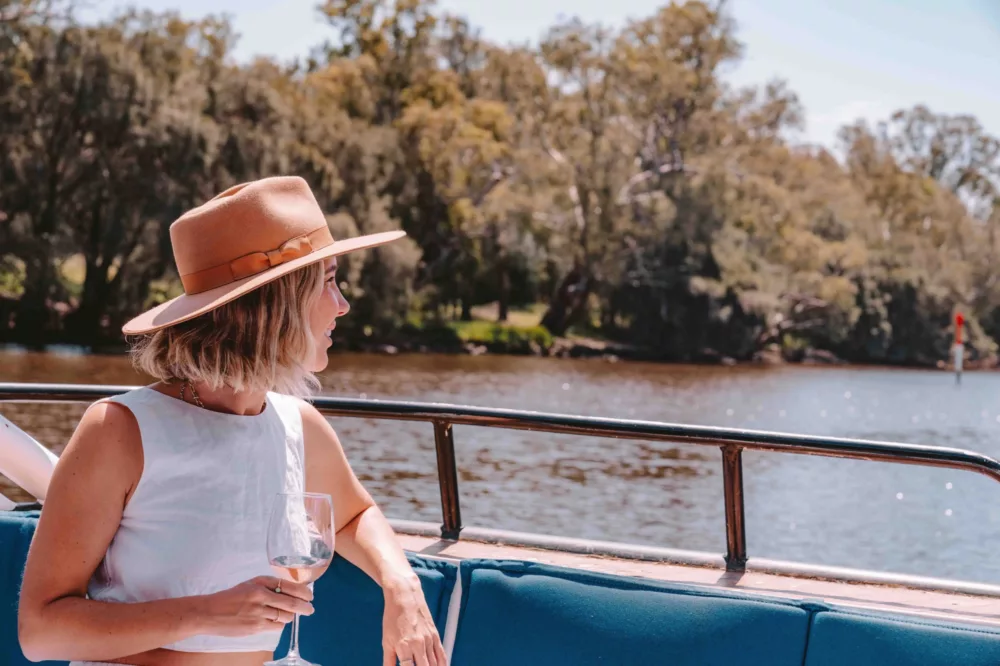 Lady cruising along the Swan River to the Swan Valley